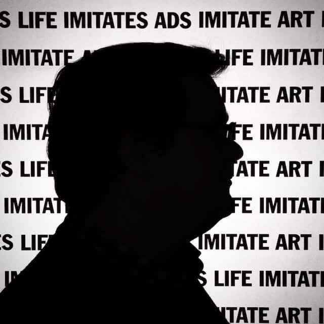 Photo of my silhouette against the words ART IMITATES ADS IMITATES ART repeatedly