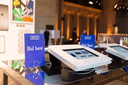 Photo of an encased iPad at an art auction.