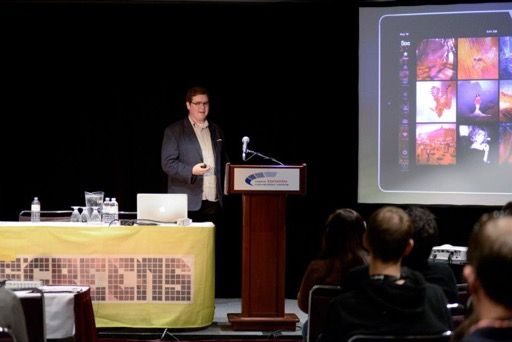 Photo of me presenting a slideshow.