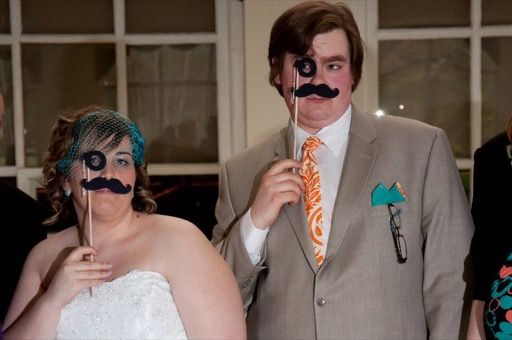 Photo of my wife and I being silly at our wedding.