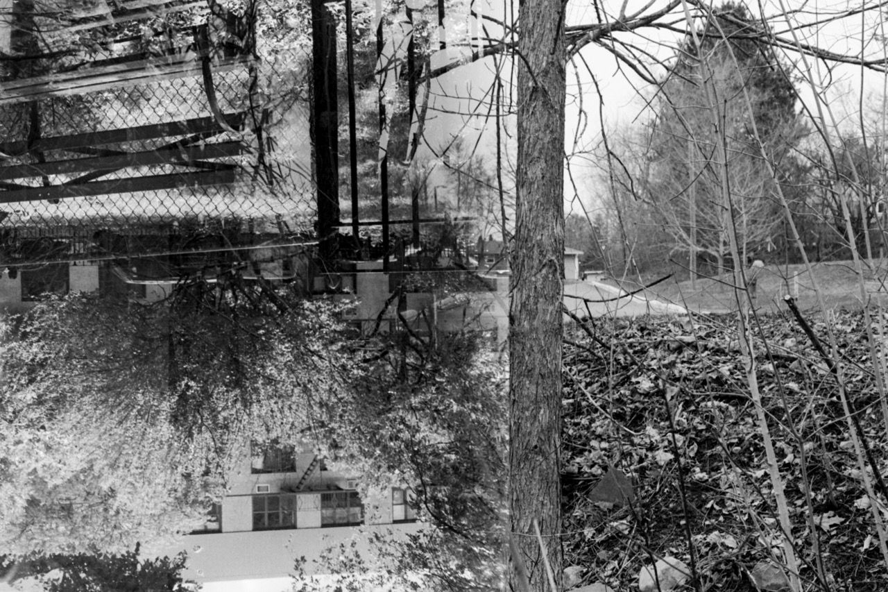Double-exposure photo with New York on the left and Fredericton on the right