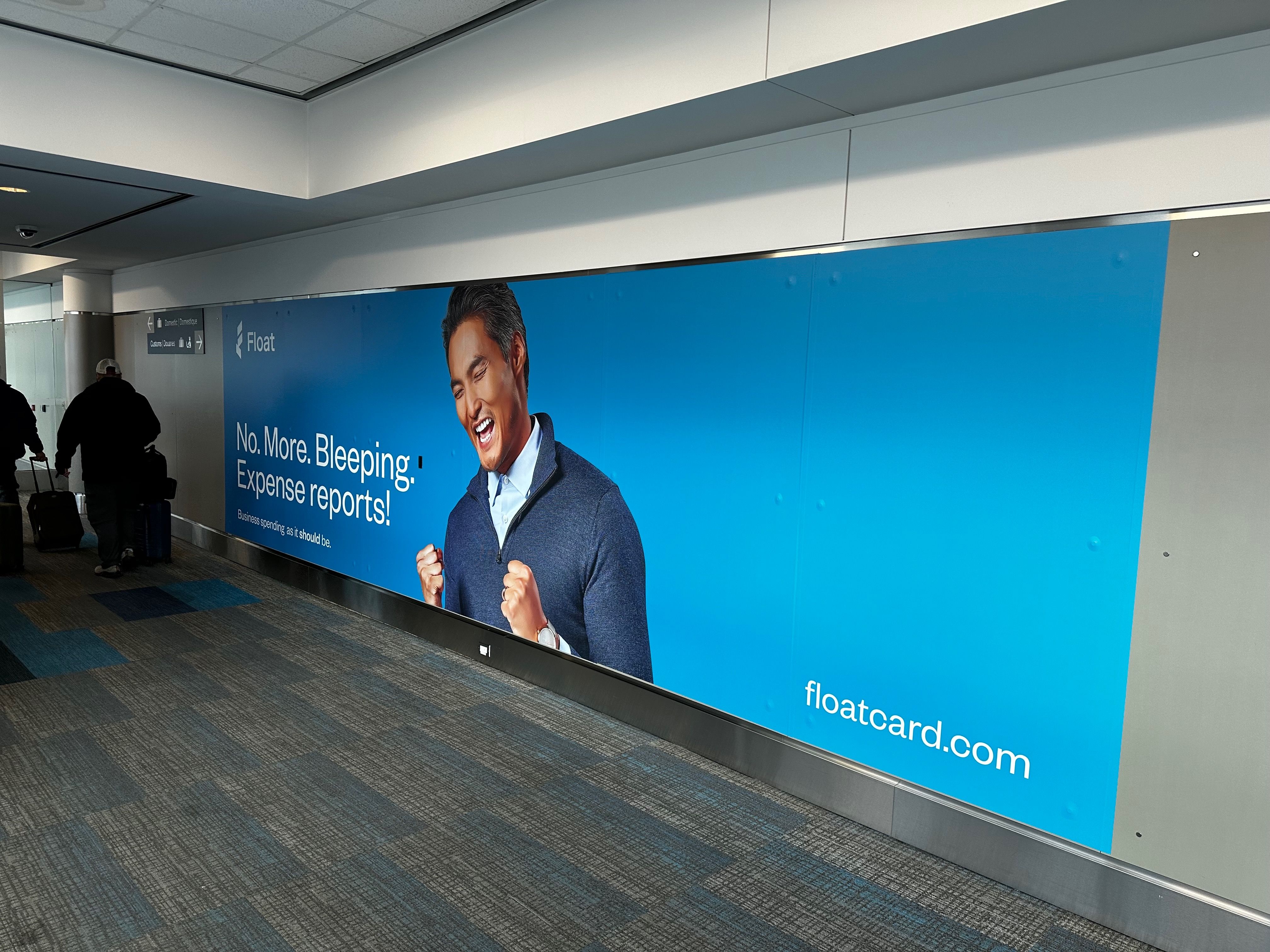 Photo of an airport advertisement for Float